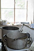 Two cooking pots inside kitchen