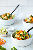 Coconut curry vegetables in a white bowl