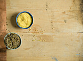 Pearl and foxtail millet on wood