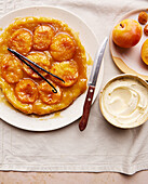 A plum tart tatin on a plate