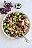 Sweet ans sour brussels sprouts with grapes and chestnuts