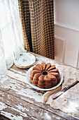 A bundt cake on a wooden table
