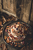 Chocolate Cake decorsted with edible flowers and leaves