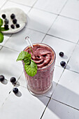 Blueberry smoothie on a white background