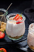 Unbaked strawberry cheesecake jars