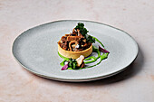 Forest mushroom, black truffle & Jerusalem artichoke tart, spinach cream, kale chips