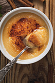 Crema Catalana Spanish Custard on a wooden kitchen top