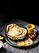 Flatlay of stuffed Aloo paratha Indian potato flatbread