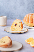 A slice of circular citrus bundt cake