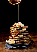 Vegan sourdough buckwheat pancakes with maple syrup