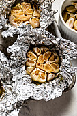 Home-baked garlic cloves in baking foil