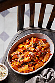 Rigatoni with sun-dried tomatoes in a bowl