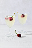 Lemon sparkling water with cherries