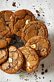 Espresso biscuits with chocolate chips on a round tray