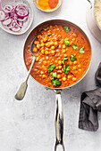 Chickpeas curry in a saucepan
