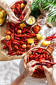 Crawfish party, cooked Louisiana, with corn on the cob, potatoes. Crawfish cooked in Cajun spices and herbs.with beer, New Orleans, Classic Cajun or Creole cuisine