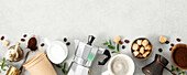 Flat screen with moka pot, espresso cup, ground coffee, milk, sugar and coffee beans on a grey concrete background. Header with brewing coffee ingredients