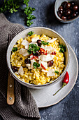 Pumpkin risotto with codfish and chili pepper