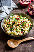 Cauliflower salad with pomegranate and hazelnuts