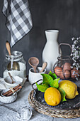 Ceramic bowls and vase near napkin placed on marble table against gray background at rustic kitchen