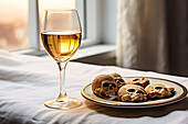 From above a delicious plate of cookies paired with a glass of wine for Halloween party created with Generative AI technology