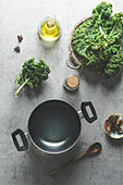Food, background ,cooking pot , green ,kale ,kale leaves, wooden ,cooking ,spoon ,star anise ,grey, concrete ,kitchen, table, Cooking, preparation ,seasonal ,winter ,cabbage,Top view,
