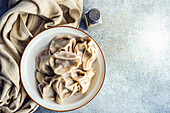 From above fresh boiled traditional Georgian khinkali in the bowl