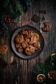 Top view of some tasty chocolate cookies with Christmas decoration