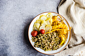 Bowl with Georgian fermented vegetables on the table