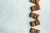 Top view of fresh baked chocolate cookies on concrete background