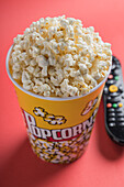 Closeup of some popcorn on a red background