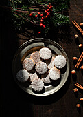 Top view of Christmas hazelnut shortbreads on a wooden table