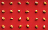 Closeup of some popcorn on a red background