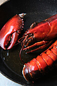 Raw lobster in sauce pan prepared for being grilled