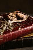 Homemade chocolate chips cookies on a old vintage book