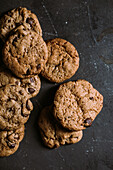From above homemade chocolate chips cookies on dark background