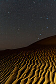 Northern stars over sand dunes, Iran