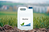 Container of biochar soil amendment