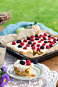 Scone cake with icing and berries