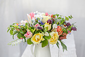Mixed spring flower bouquet with tulips and chequerboard flowers (Fritillaria meleagris)
