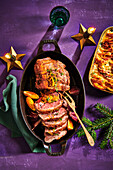 Stuffed leg of lamb with potato gratin