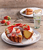 Donut cake with icing and strawberries