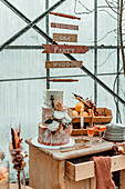 Wedding cake and festive decoration in rustic ambience