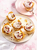 Baklava cupcakes with walnuts and a lemon and cream topping