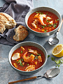 Sicilian-style fish soup with prawns and vegetables