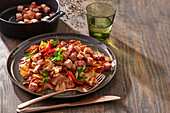 Stir-fried cabbage with bacon and chilli