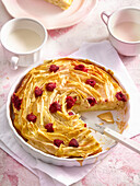 Puff pastry cake with oranges and raspberries