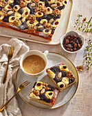 Yeast sheet cake with poppy seeds, plum jam and nuts