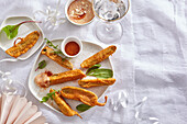 Baked gherkins with garlic dip and horseradish mayonnaise