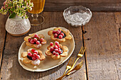 Blossom tartlets with chocolate cream and redcurrants